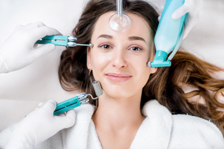 Woman’s facial treatment Microneedling with PRP